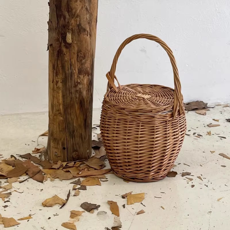 Large woven straw bucket bag