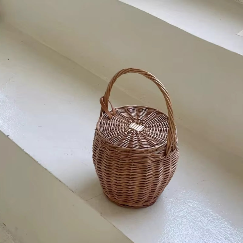 Large woven straw bucket bag