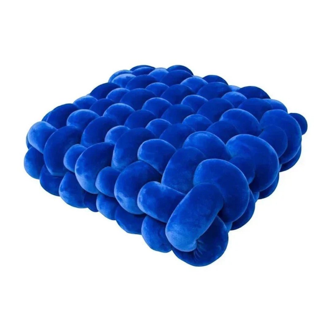 Deep pressure sensory cushion with hand pockets and textured structure