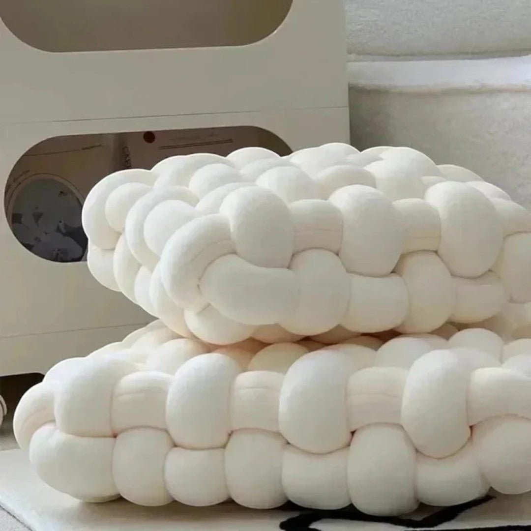 Deep pressure sensory cushion with hand pockets and textured structure