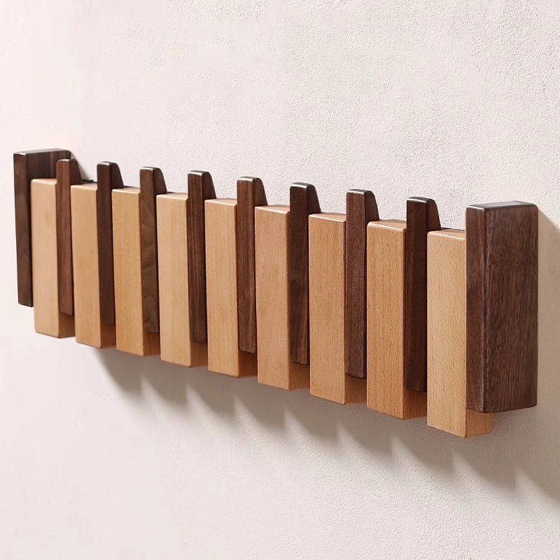 Support mural crochets pliables cachés style piano