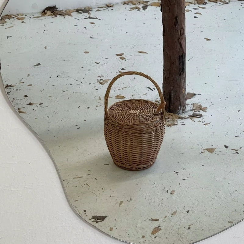 Large woven straw bucket bag