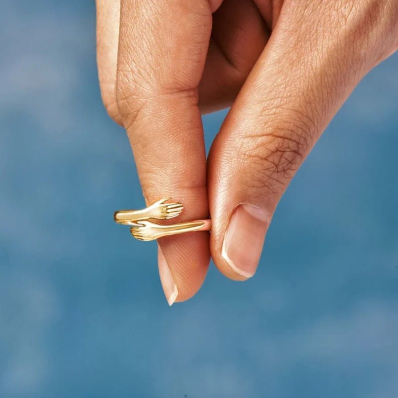 Angelica – Bague ouverte ajustable avec mains entrelacées
