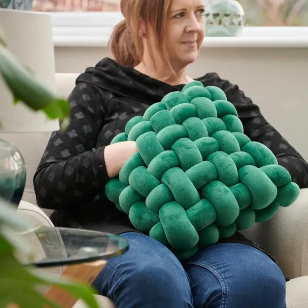 Deep pressure sensory cushion with hand pockets and textured structure