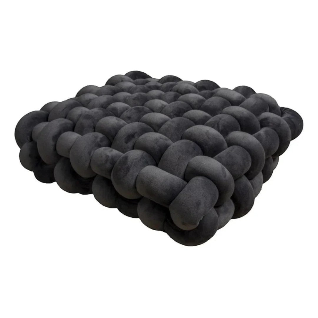 Deep pressure sensory cushion with hand pockets and textured structure