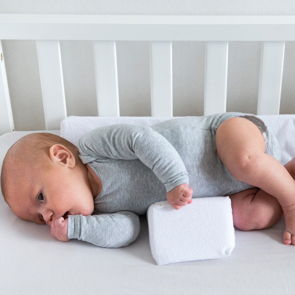 Oreiller anti-roulement pour bébé