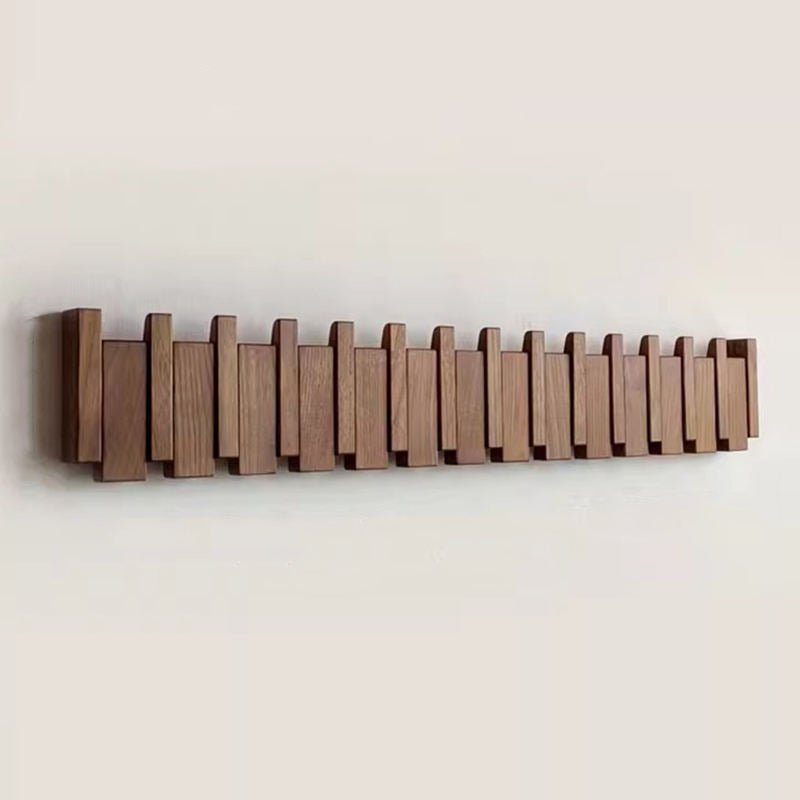 Support mural crochets pliables cachés style piano